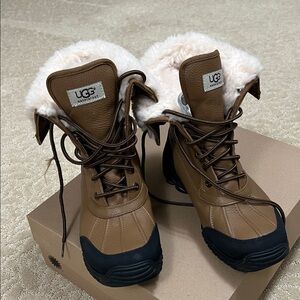 UGG Tan and Black Lace-Up Boots